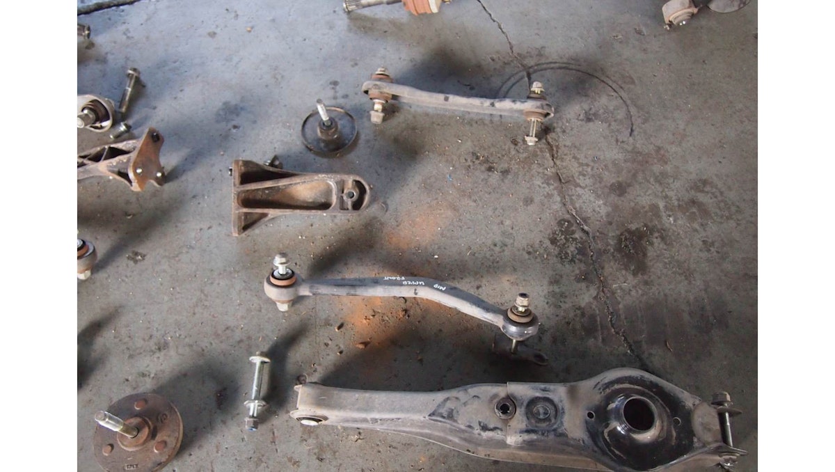 Cradle with arms attached is being refitted to the vehicle